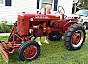 Art Gagnon and his dad's 1952 Farmall tractor